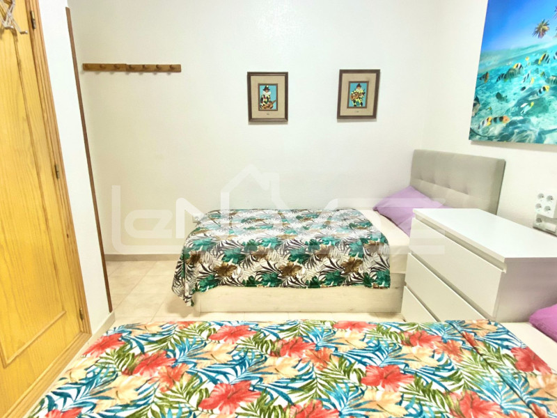 Cozy 2-bedroom apartment with park and side sea views in the center of La Zenia. #1113