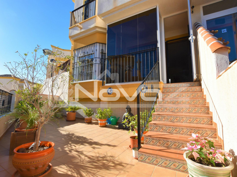 Ground floor apartment with 2 bedrooms at the end of the block, large western garden, garage and two pools!. #1207