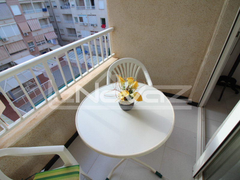 Spacious 1 bedroom apartment with pool view terrace just 300m from de la Cura and de los Locos beaches in Torrevieja.. #1243