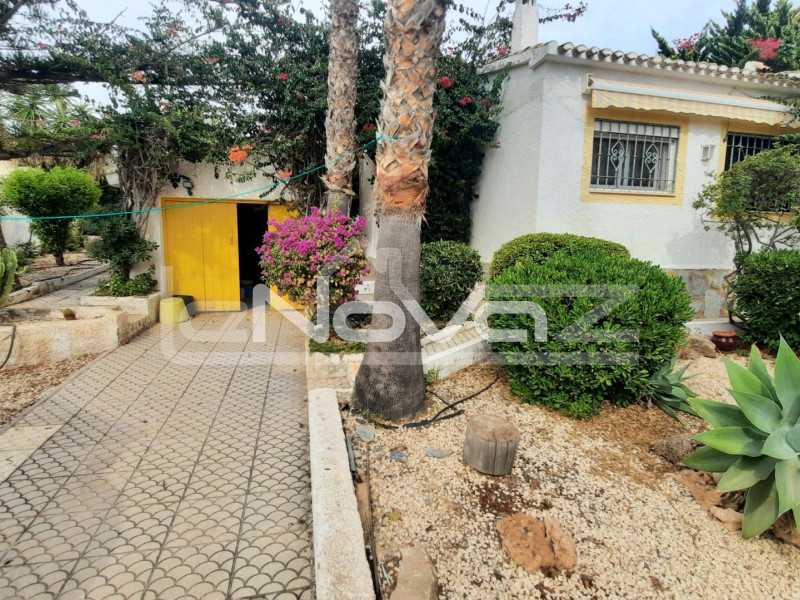 Large detached south facing villa with swimming pool in a prime location just 200 meters from the sea in Playa Flamenca.. #1250