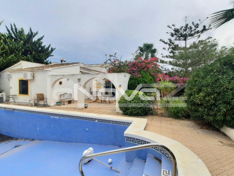 Large detached south facing villa with swimming pool in a prime location just 200 meters from the sea in Playa Flamenca.. #1250