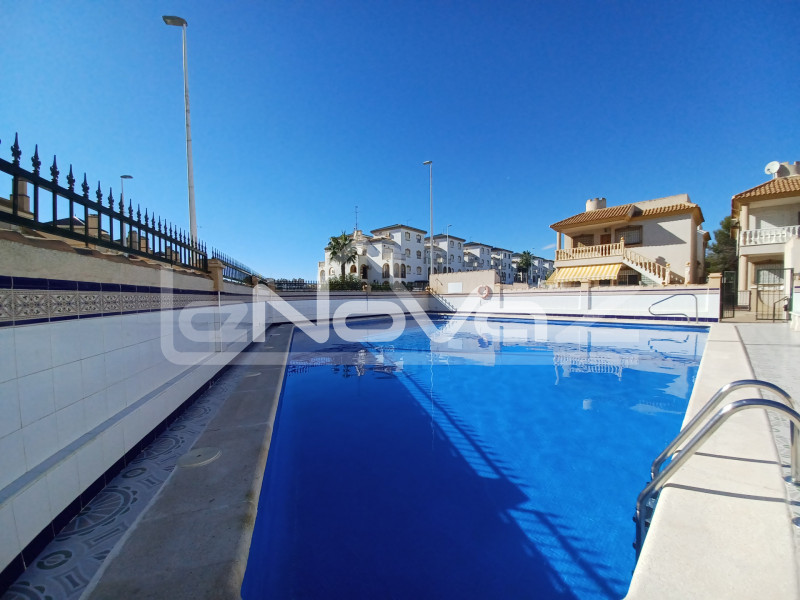 Spacious ground floor apartment with 2 bedrooms with large terrace and garden plot in a beautiful urbanization in the center of La Zenia.. #1344