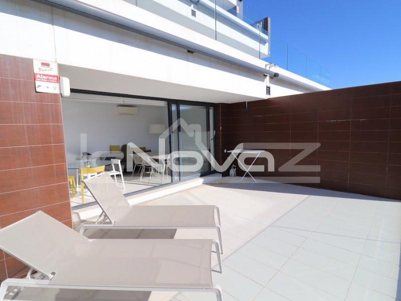 Stunning modern apartment with 2 bedrooms and a huge terrace overlooking the sea in Villamartin.. #1346