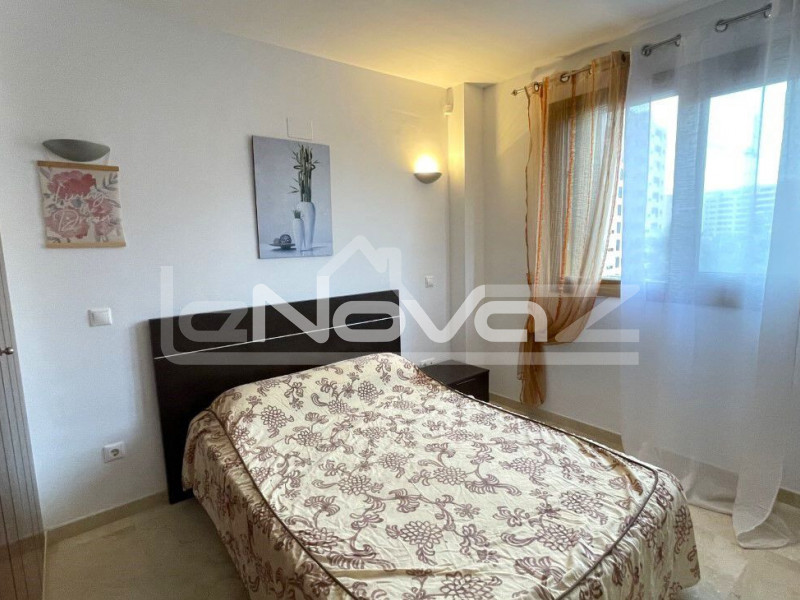 Spacious 2 bedroom apartment with a large terrace overlooking the sea 200 meters from the beach in Punta Prima.. #1348
