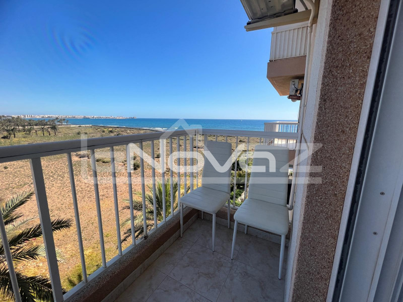 Apartamento de 1 dormitorio y terraza con vistas al mar a tan solo 150 m de la playa en Punta Prima.. #1500
