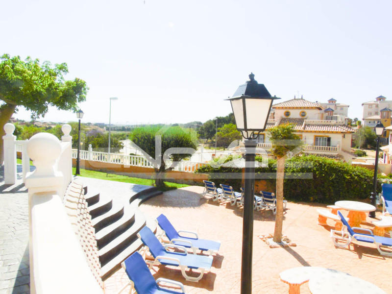 Incredible 2 bedroom semi-detached villa with garden and solarium overlooking the sea in Lomas de Cabo Roig.. #924